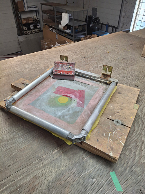 Screen-printing frame on a workbench in a workshop