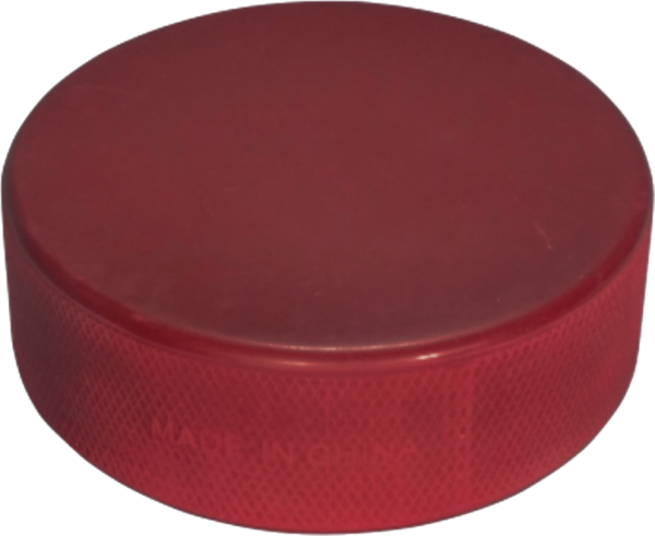 Maroon coloured hockey puck