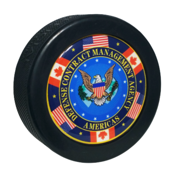 Defence Contract Management Agency Americas logo on a domed hockey puck