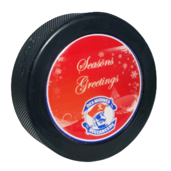 Domed hockey puck with a red “Season’s Greetings” Des Moines Buccaneers design