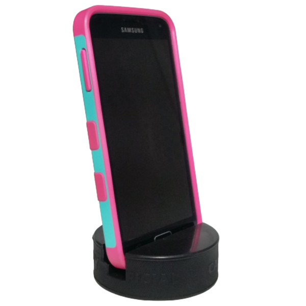 Samsung smartphone in a pink and teal protective case in a puck phone holder