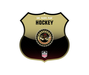 Hockey shield sign with “Eat, Sleep, Play Hockey” and the Muskegon Lumberjacks emblem