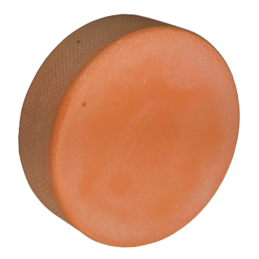 Orange sponge hockey puck